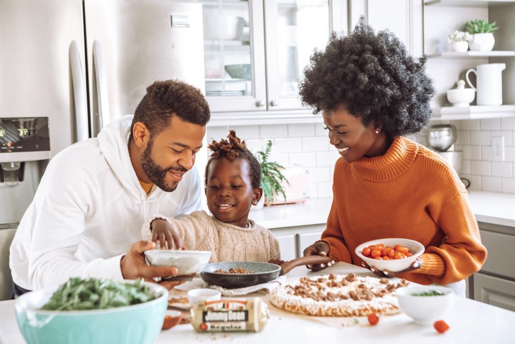 Happy family cooking in the kitchen