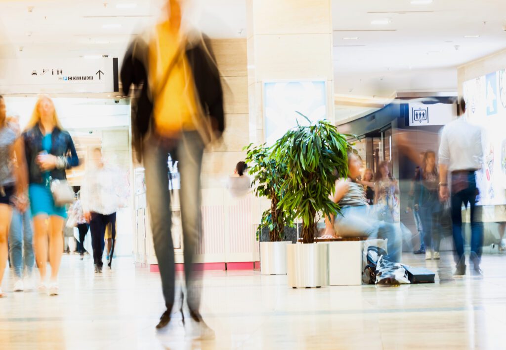 People walking through a shopping centre