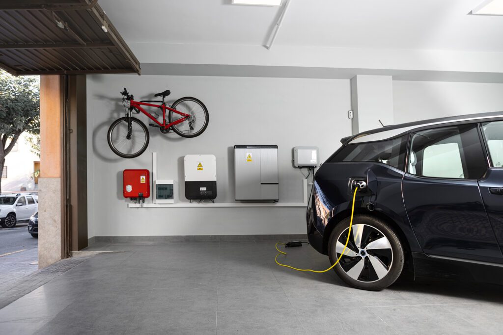 Battery and EV charger in a garage